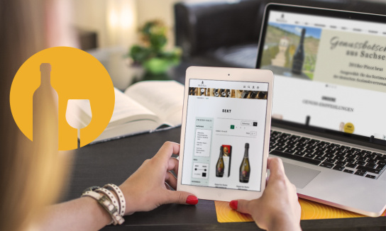 Foto: Tablet und Laptop mit Onlineshop von Schloss Wackerbarth.