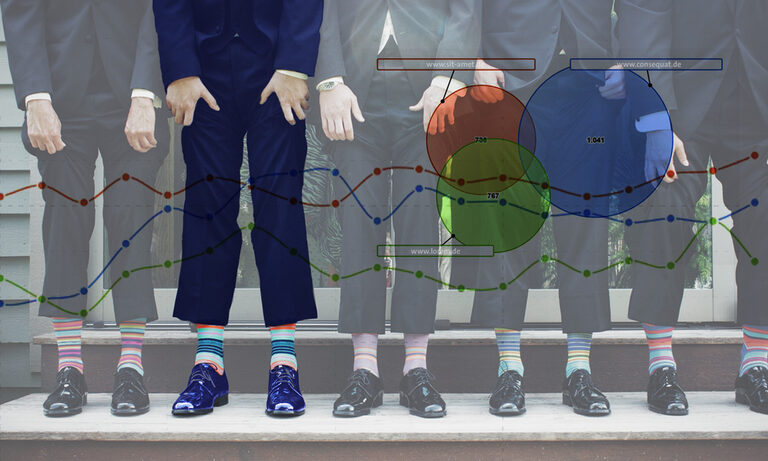 Grafik: Personen im Anzug mit bunten Socken, davor ein Liniendiagramm