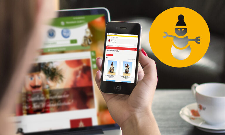 Online-Shop www.erzgebirgsshop24.de von Sandstein Neue Medien Foto: Handy und Laptop mit der Webseite des Erzgebirgs-Shop 24.