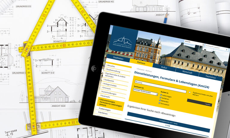 Amt24-Anbindung auf www.annaberg-buchholz.de Foto: Tablet mit Dienstleistungen aus Annaberg-Buchholz. Darunter Baupläne